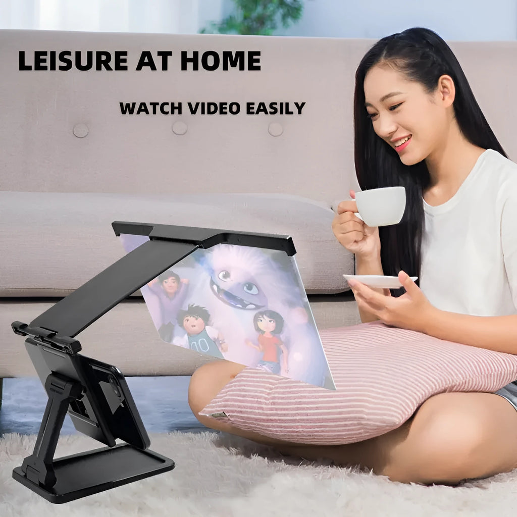 Black 12-inch curved mobile phone screen amplifier with separate folding phone holder on desktop