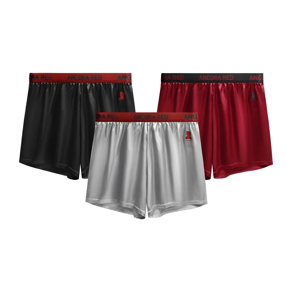 Solid colour men's polyester boxer briefs in six colour options showing mid-waist design