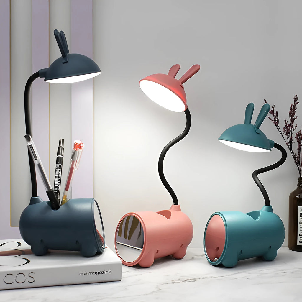 Cartoon-style USB desk lamp with pen container in dark blue, green or pink colours
