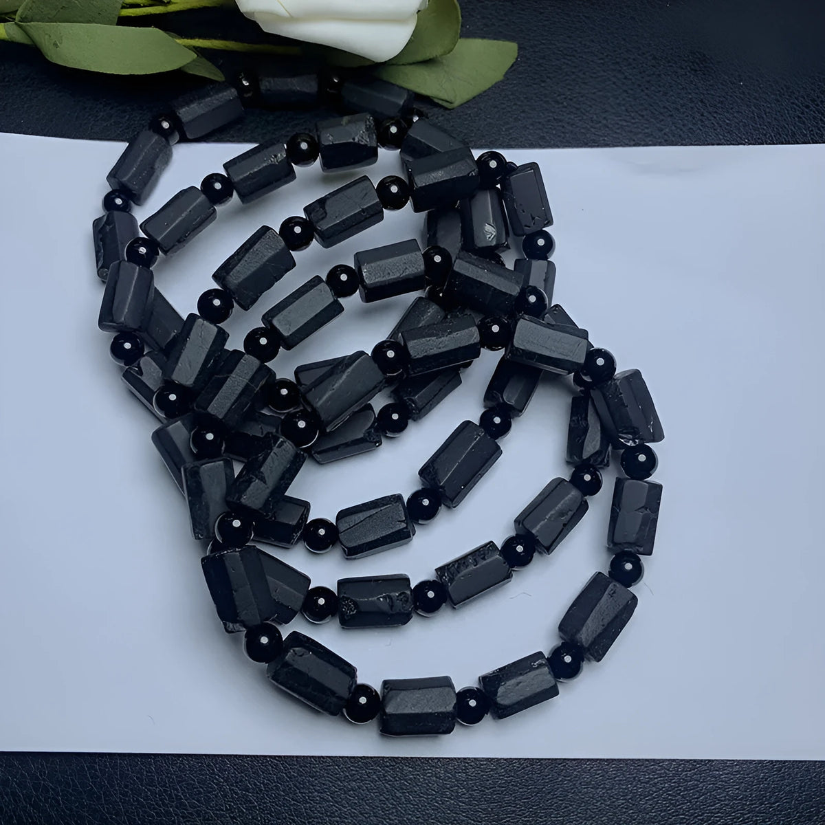 Black tourmaline rough stone bracelet with 8.5-9mm beads and Seiko treatment