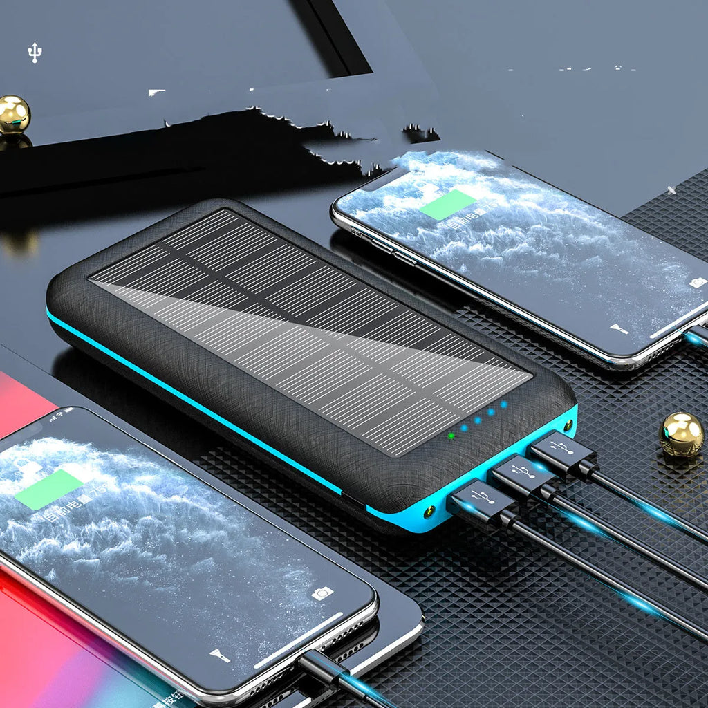 Black portable power bank with Qi wireless charging pad and three USB ports on the side