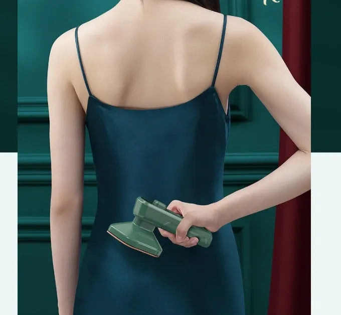 Dark green portable hanging ironing machine with ceramic panel and handheld design