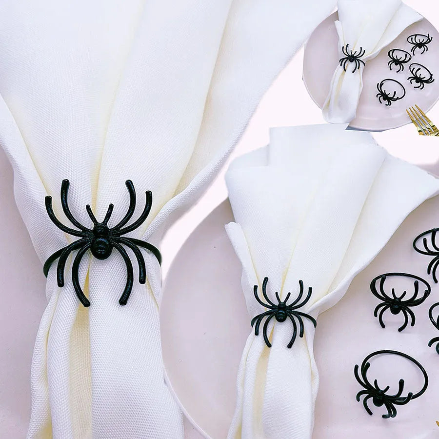 Six black spider-shaped alloy napkin rings for Halloween table decoration