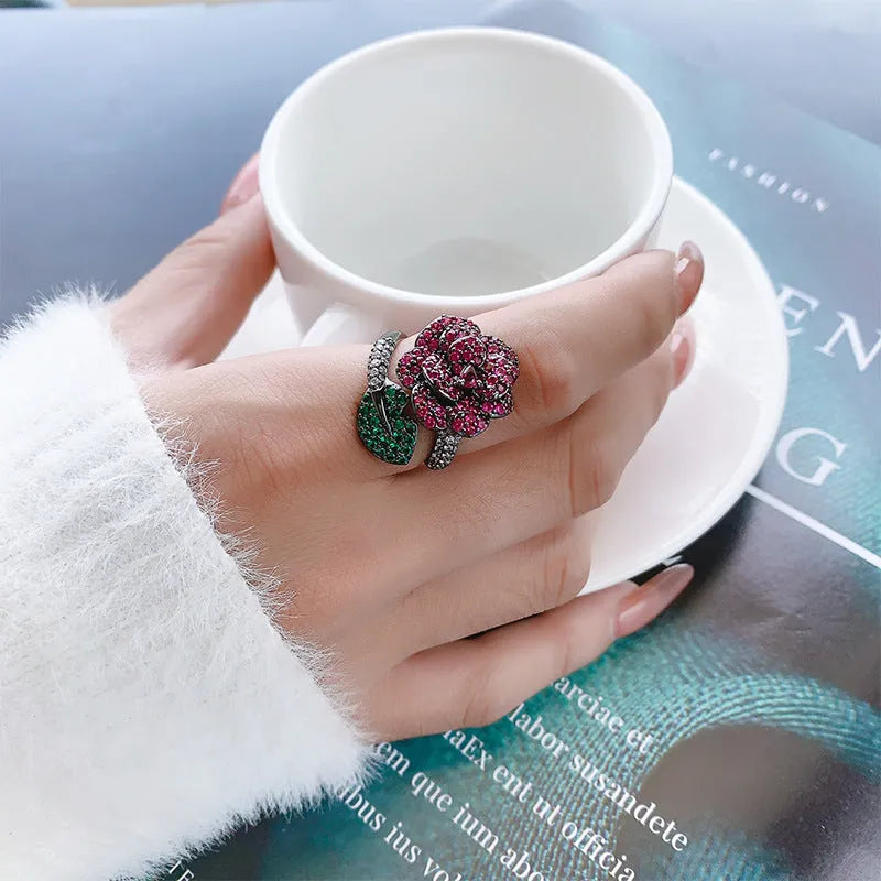 Geometric black gold ring with simulated red corundum stones for women