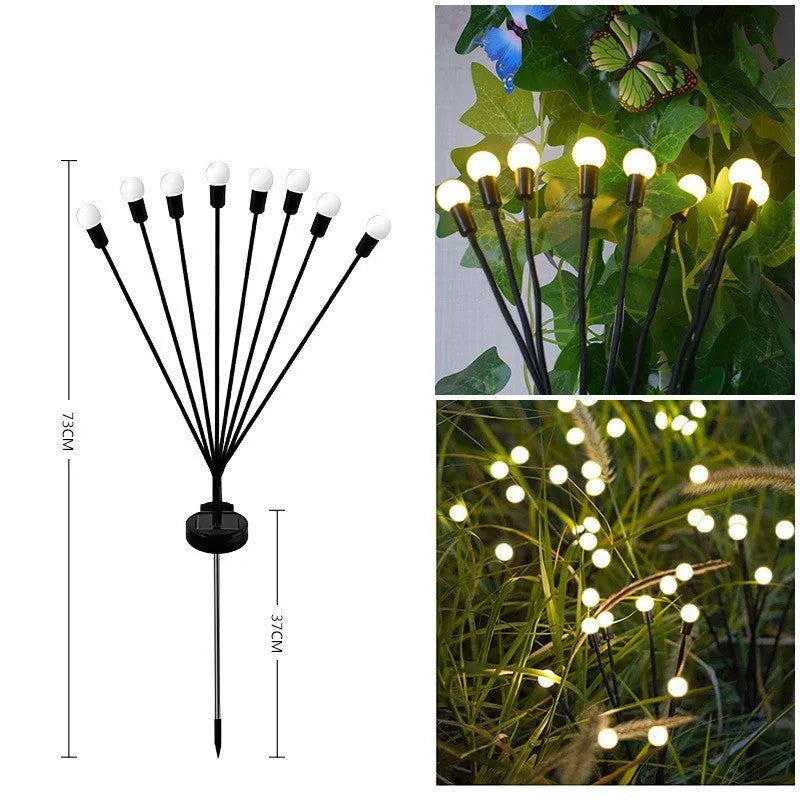 Solar-powered LED garden spike light with stainless steel ground plug stuck in soil.