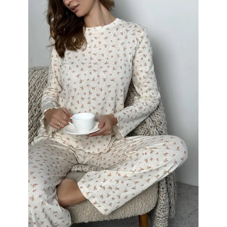 Women's white floral print pyjama suit with bell sleeve top and wide leg trousers