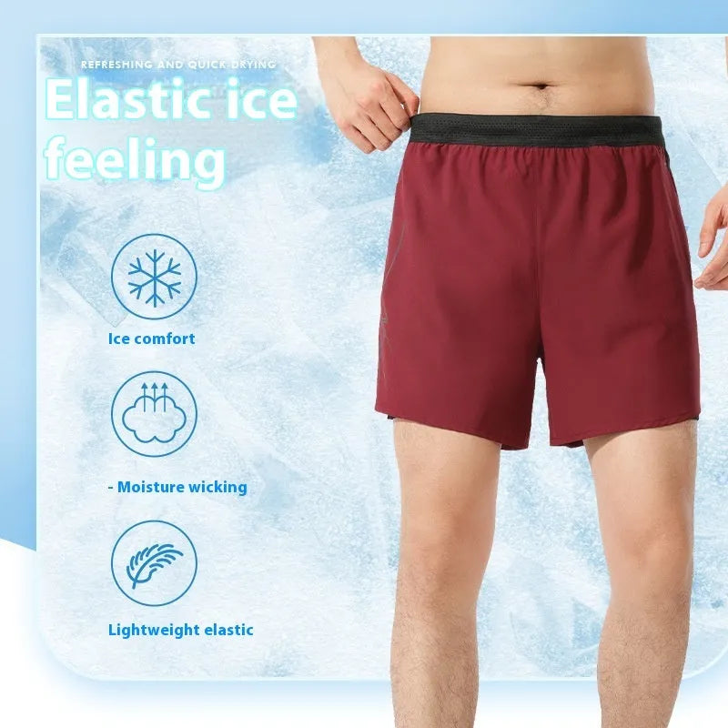 Men's solid colour polyester basketball shorts on a hanger, showing low-waist design.