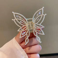 Butterfly hair barrettes for women in alloy with rhinestone or pearl decoration