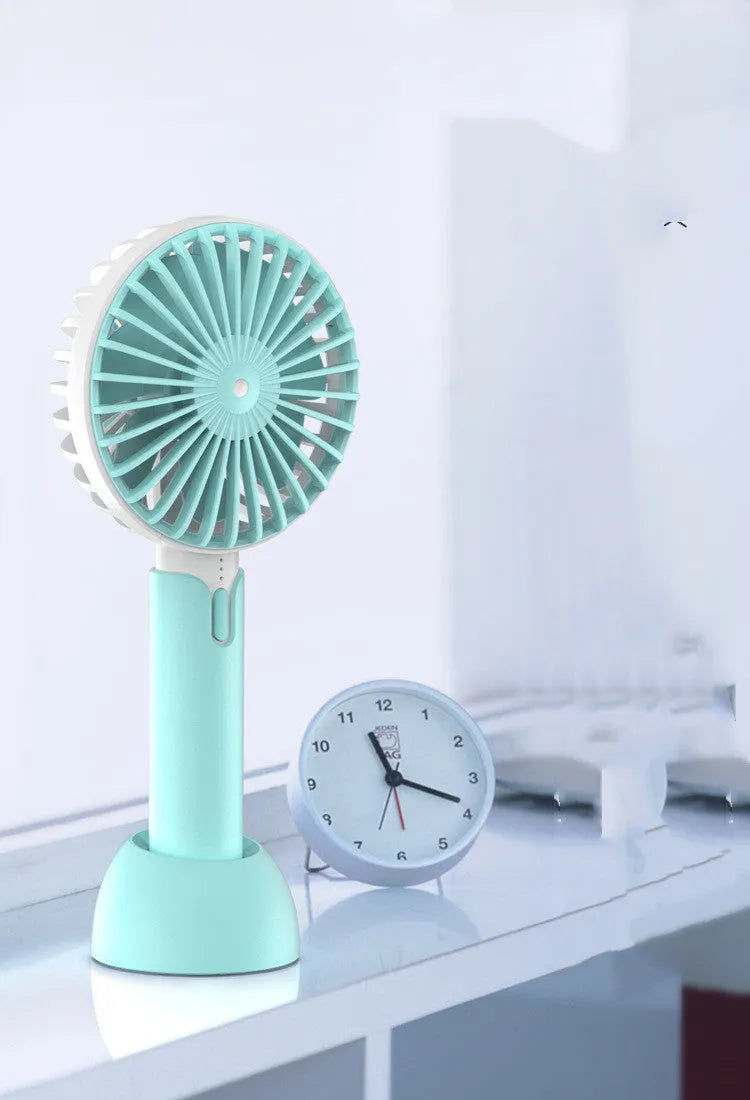 Blue portable USB desktop fan with three-speed control and figure-8 head oscillation