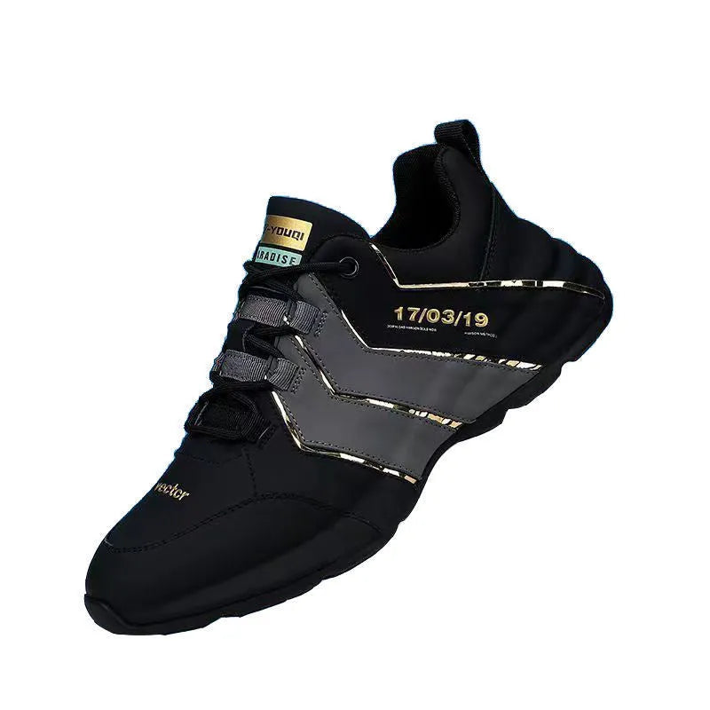 Men's black and grey low-top casual sneakers with thick plastic sole and lace-up front