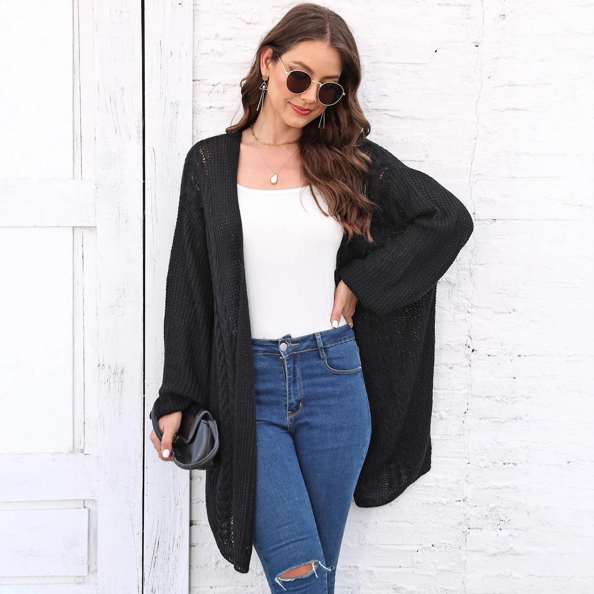 Women's loose casual acrylic sweater coat cardigan in free size showing European American style design