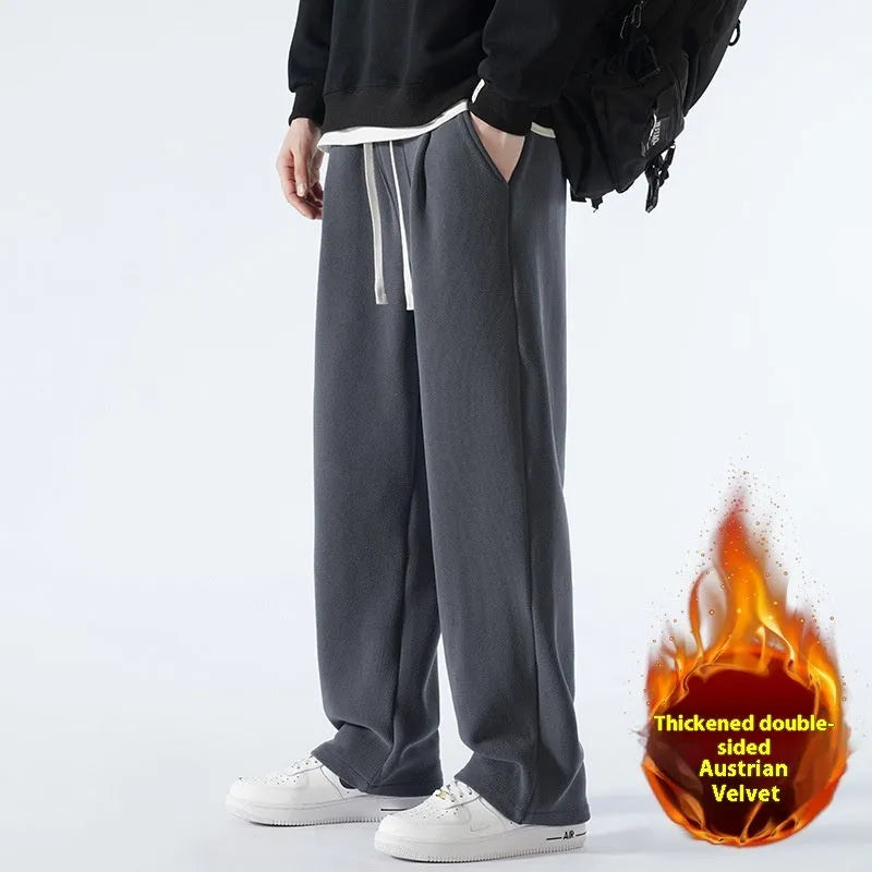 Men's apricot coloured fleece-lined loose fit sports trousers with an elasticated drawstring waist.