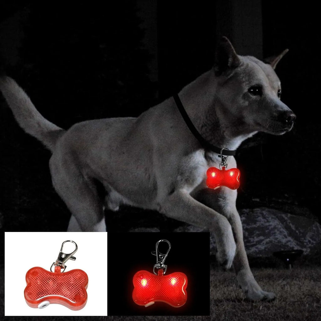 Plastic bone-shaped LED light pendant for attaching to a pet dog or cat collar.