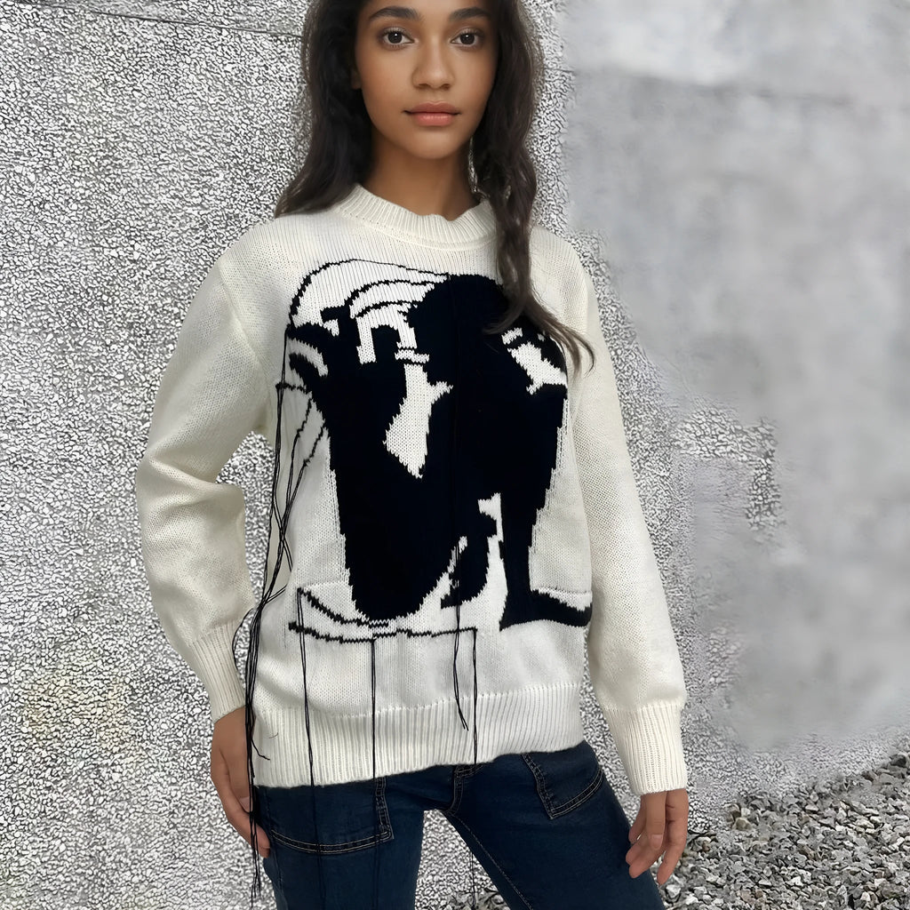 Women's grey alpaca wool sweater with abstract pattern and tassel design on front