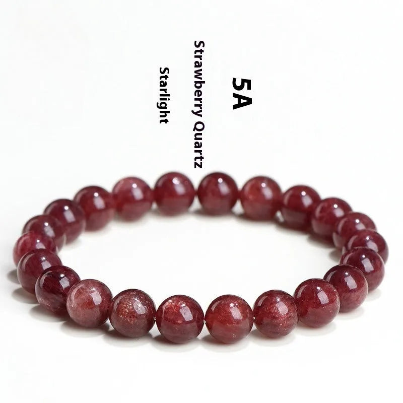 Natural strawberry quartz bracelet with geometric cherry red beads showing a starlight sparkle.