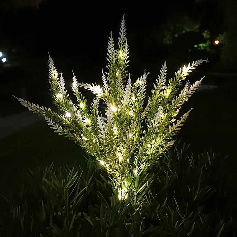 74cm tall solar-powered LED garden light with artificial flower design in lavender colour variations