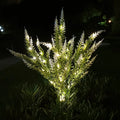 74cm tall solar-powered LED garden light with artificial flower design in lavender colour variations
