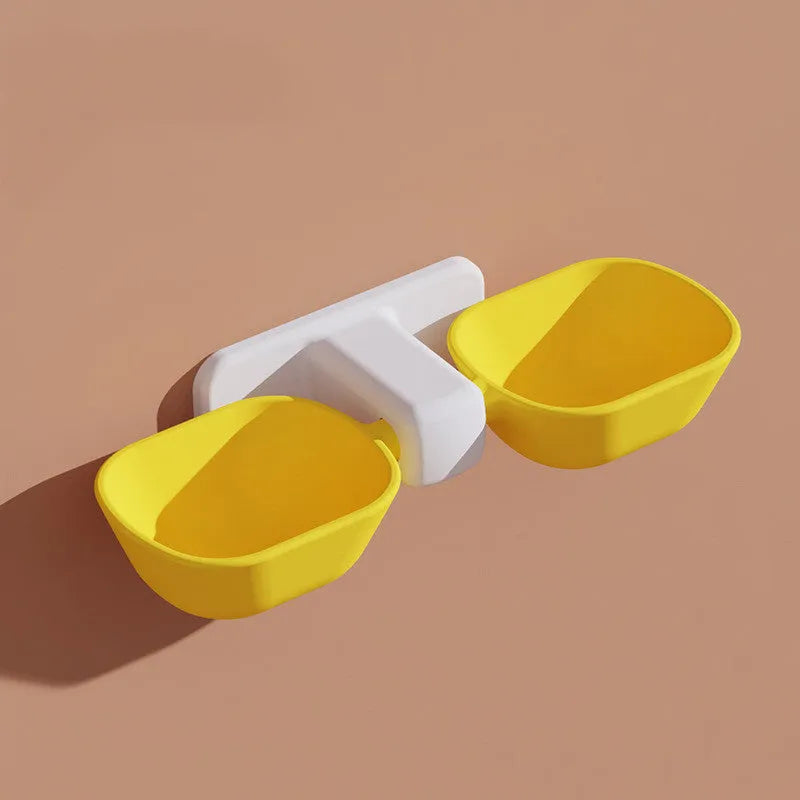 Automatic plastic pet feeder with double bowl and adjustable height, shown in white or yellow with one cat bowl