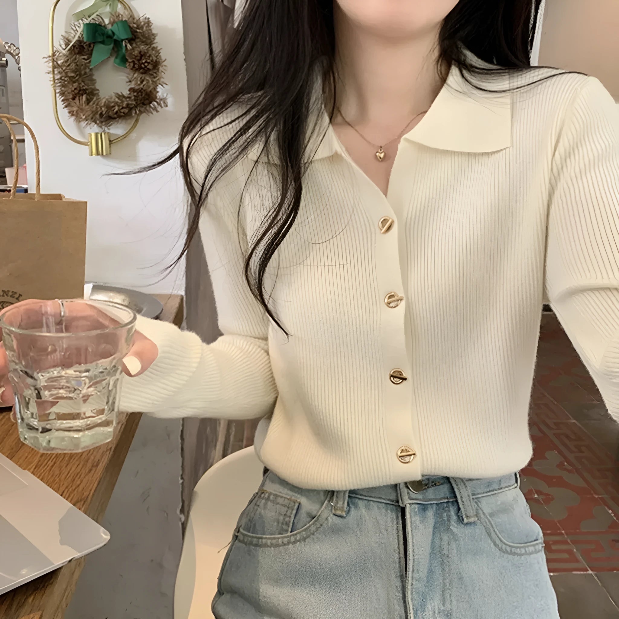 Women's beige loose-fit long-sleeved knitted cardigan top made from viscose fibre.