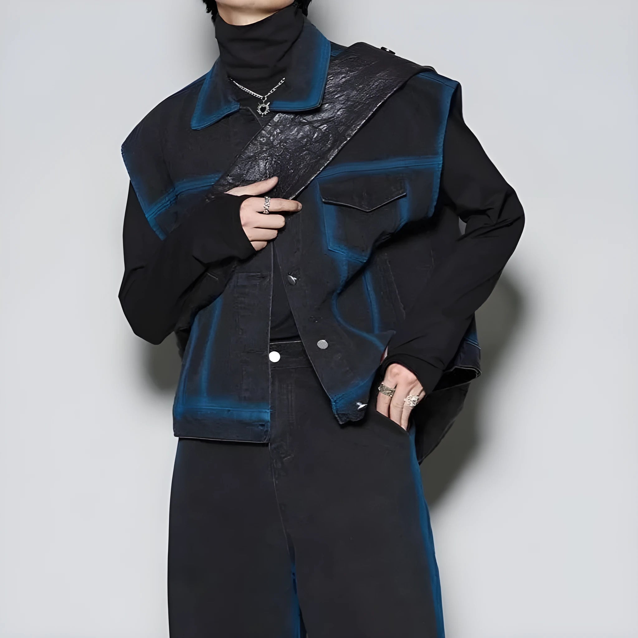 Blue distressed fleece-lined vest and jeans two-piece suit set on a model, showing spray colour gradient detail.