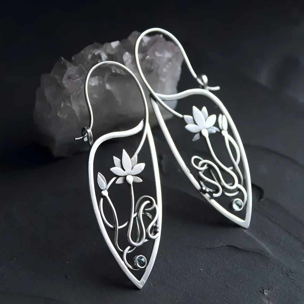 Silver lotus vine design rhinestone earrings with floral geometric pattern