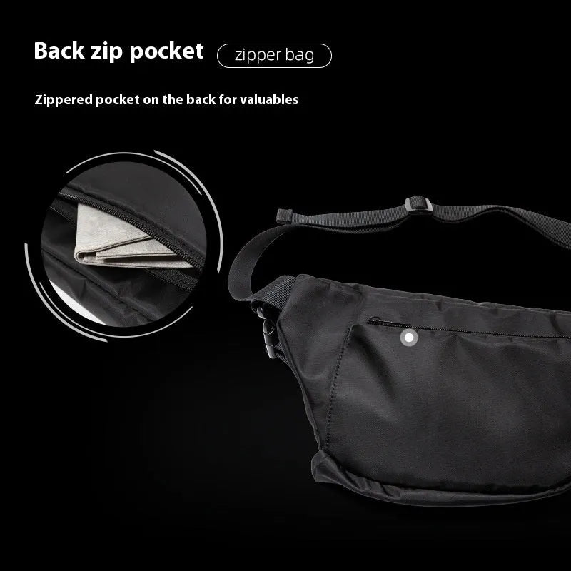 Black men's slanted chest bag in Oxford fabric with visible stitching, shown worn across the chest.