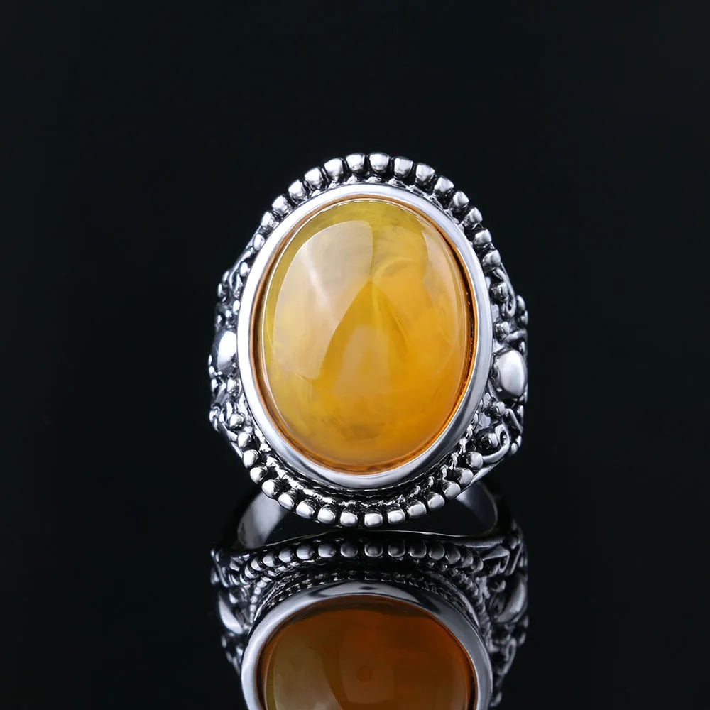 Alloy geometric retro ring with antique silver amber colour and fluorescent beeswax detailing