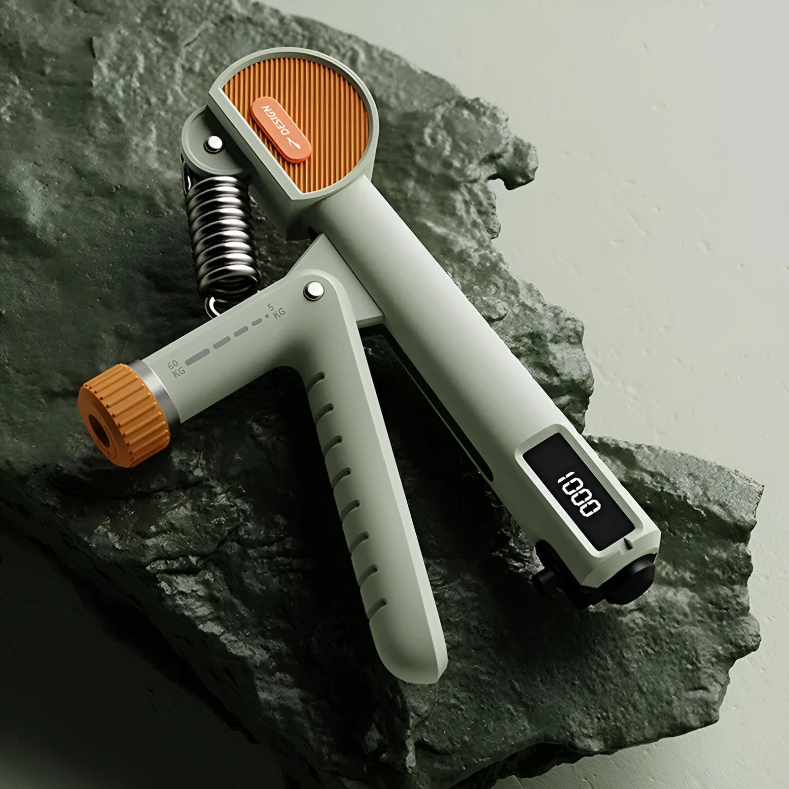 Adjustable spring hand grip trainer in ABS plastic with measurements showing 15cm length