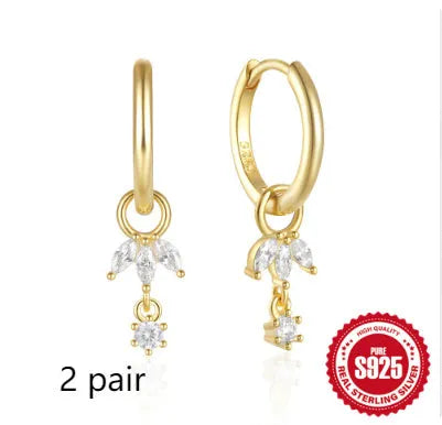 Geometric sunflower earrings in golden S925 sterling silver with inlaid zircon stones.