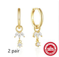 Geometric sunflower earrings in golden S925 sterling silver with inlaid zircon stones.
