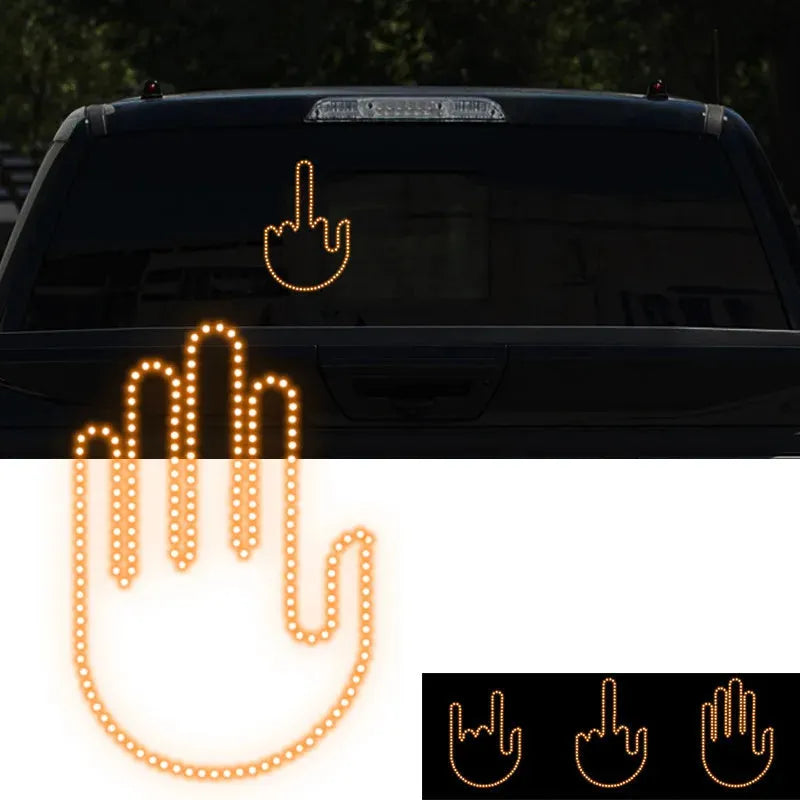 Black plastic LED gesture light for cars showing middle finger symbol with remote control