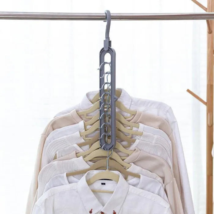 Plastic clothes hanger with a rotating hook in assorted colours on a white background.