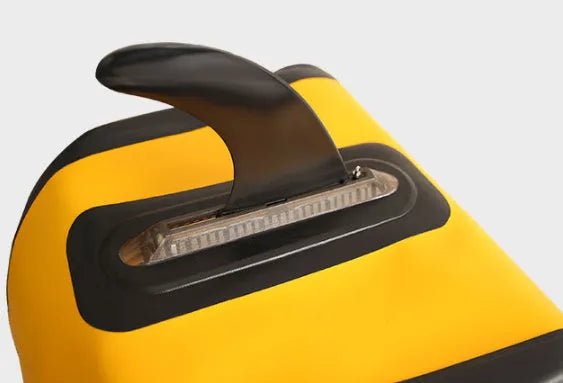 SUP paddle with attached plastic water dispenser and large removable fish fins