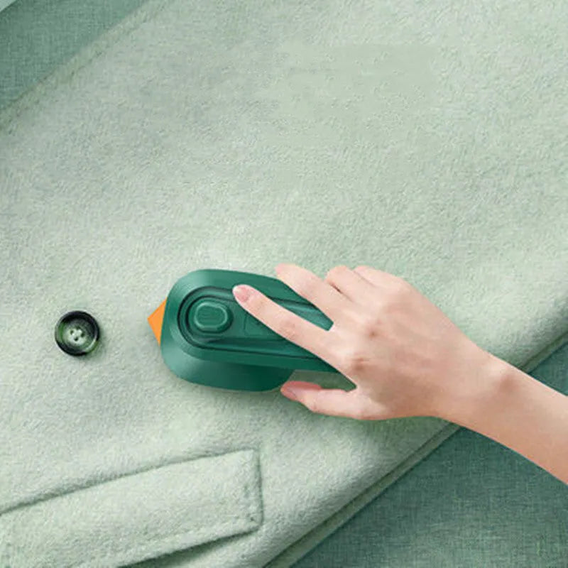 Dark green portable hanging ironing machine with ceramic panel and handheld design