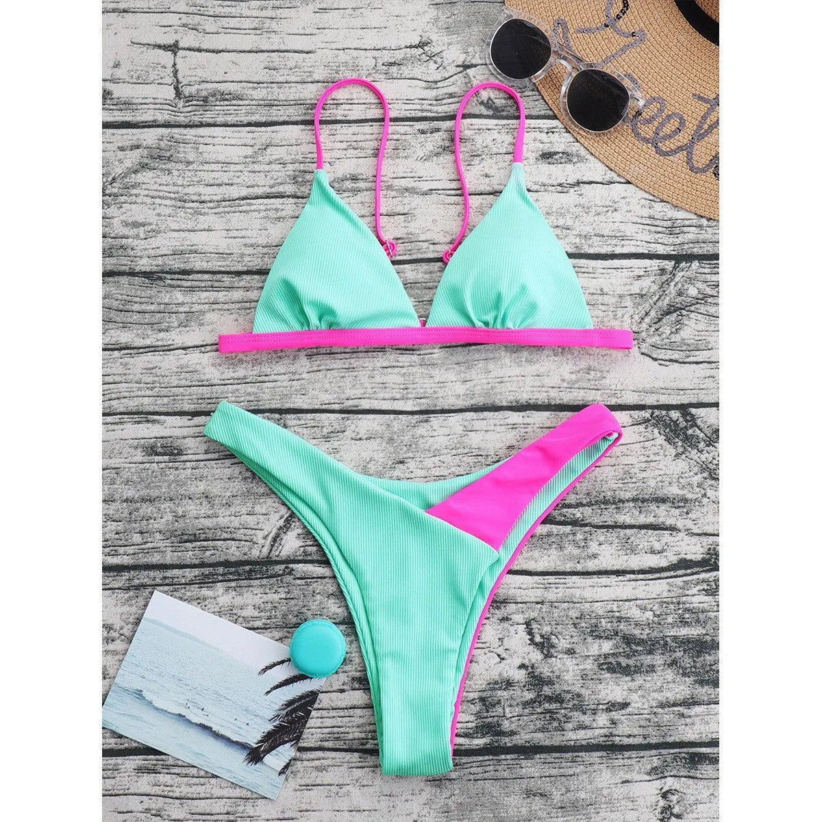 Women's two-piece nylon swimsuit briefs set in a pattern design, showing bra and matching bikini bottoms.