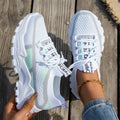 Women's Flyknit mesh lace-up sneakers in a multi-tonal colour with a flat rubber sole.