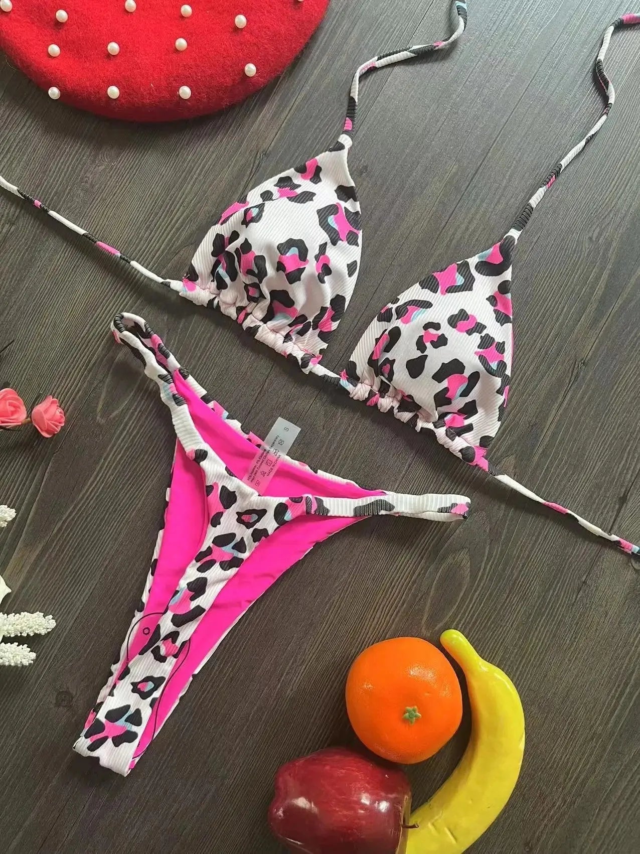 Women's printed bikini swimsuit with quick-drying fabric shown in one of three available colour options
