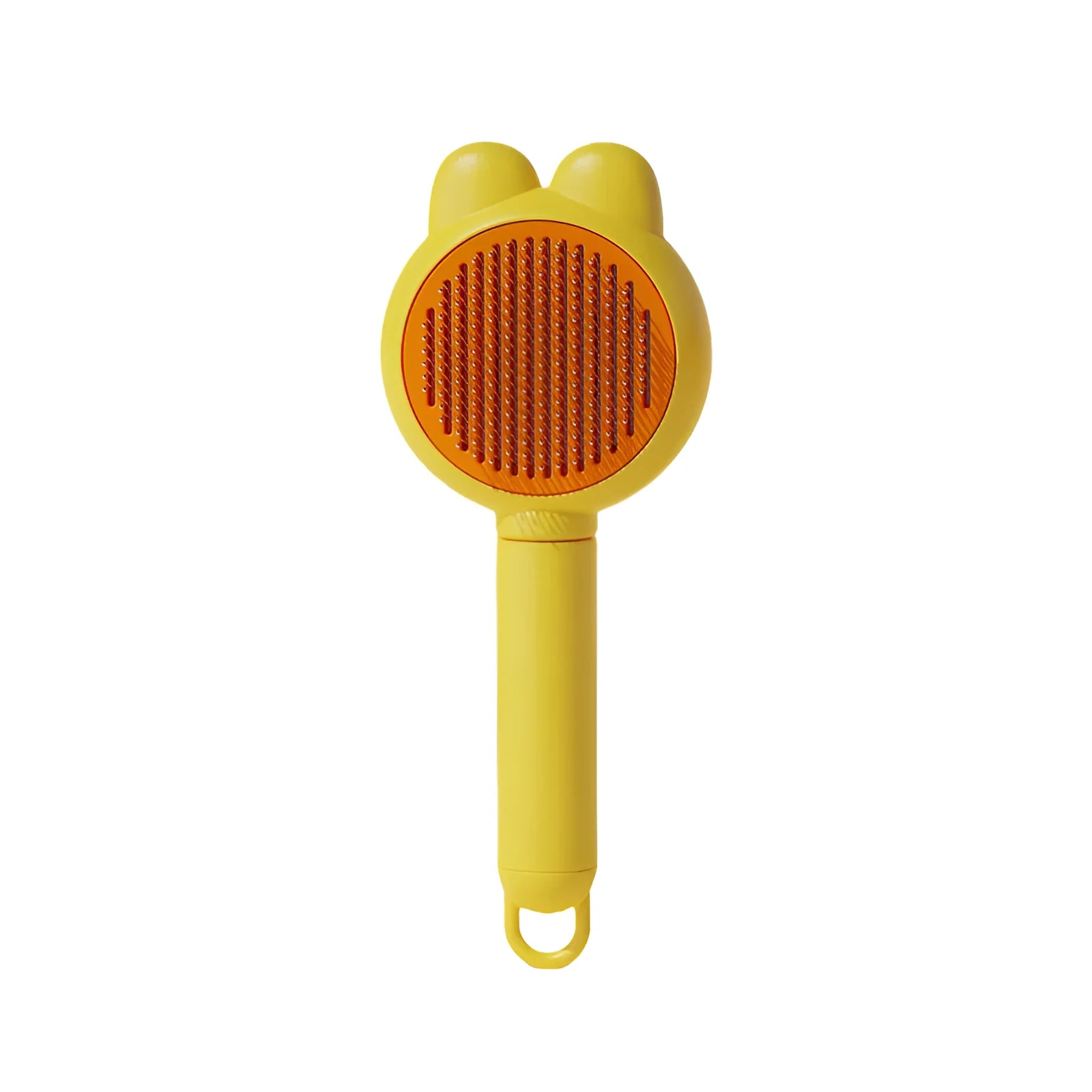 Green self-cleaning pet grooming brush with release button and stainless steel comb teeth.