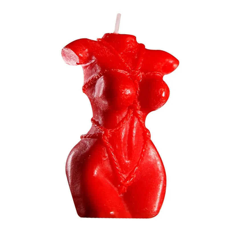 Low temperature soy wax candle shaped like a bikini, shown in rose red, pink, and purple colours.
