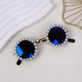Pearl-rimmed round sunglasses for cats and dogs in multiple colours as costume accessories