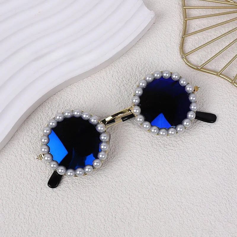 Pearl-rimmed round sunglasses for cats and dogs in multiple colours as costume accessories
