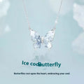 Close-up of a silver butterfly pendant necklace on an adjustable O-ring chain.