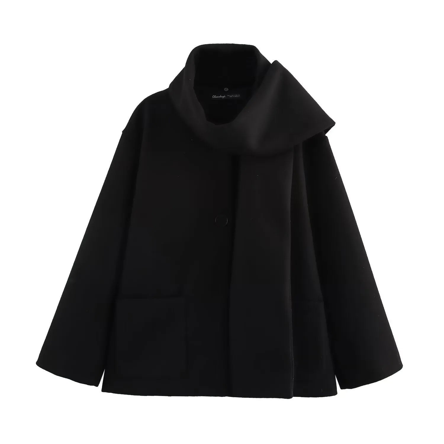 Women's long black polyester coat with a faux fur collar, shown in a street fashion style.