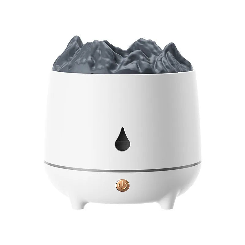 White volcano-shaped ultrasonic humidifier with USB cable on wooden table