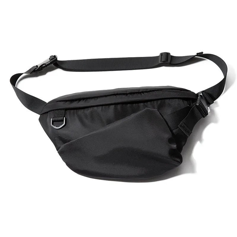 Black men's slanted chest bag in Oxford fabric with visible stitching, shown worn across the chest.
