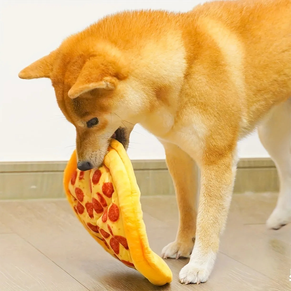 Yellow pizza slice shaped dog chew toy with squeaker for small medium dogs