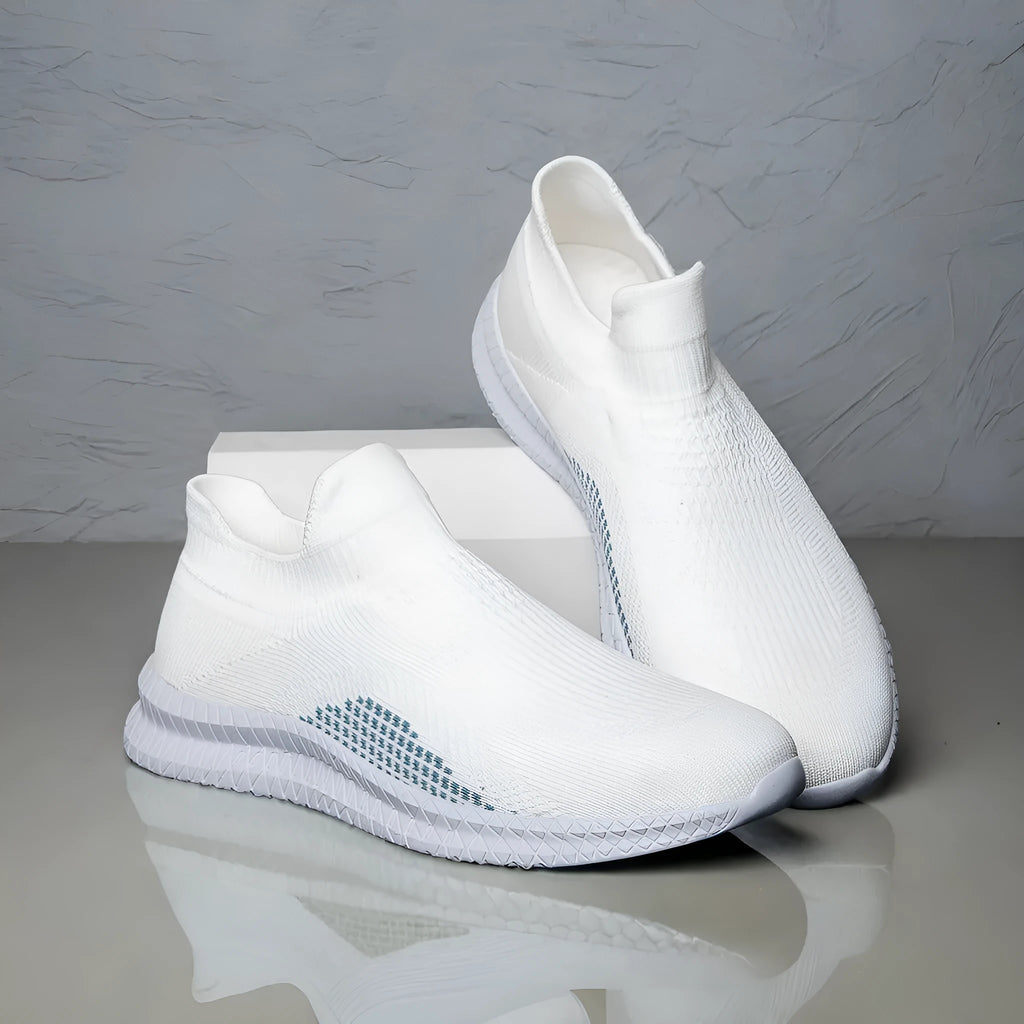 Men's white popcorn flyknit low-top casual sneakers on a plain background