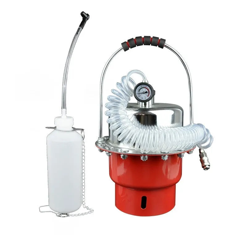 Steel-frame pneumatic brake fluid replacement tool with large tank, pressure gauge, regulator, and clear drain pipe on a workshop bench.