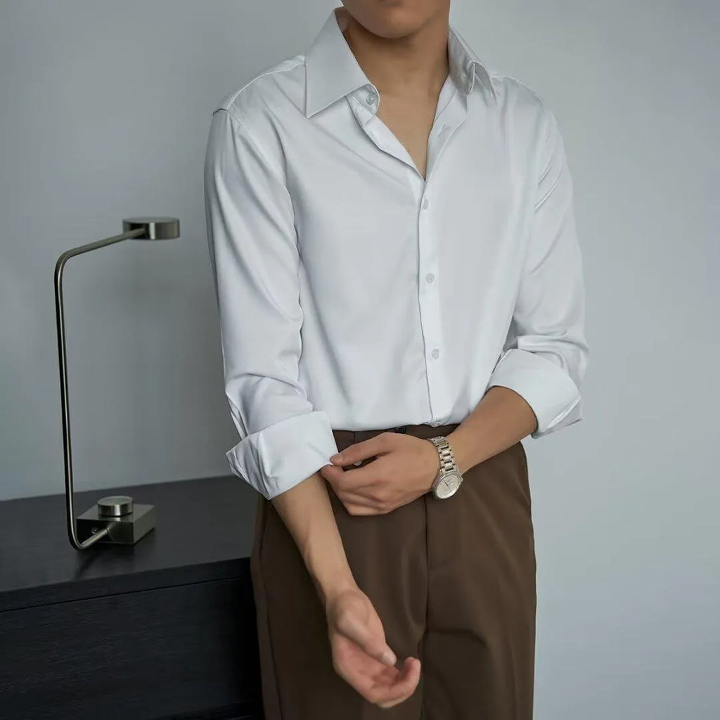 Man wearing a black slim-fit Japanese retro style long sleeve cardigan shirt.