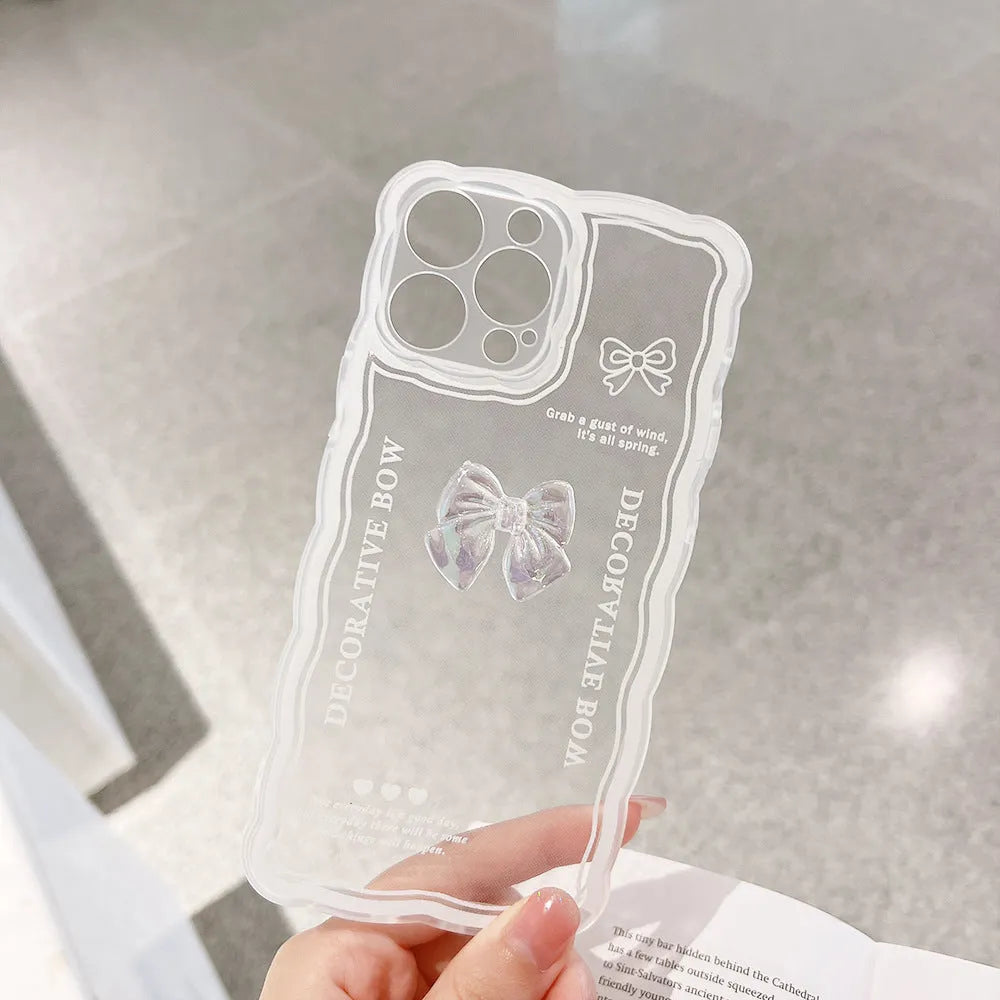 Transparent iPhone case with 3D ice crystal bow decoration on back, optional white love lanyard attachment